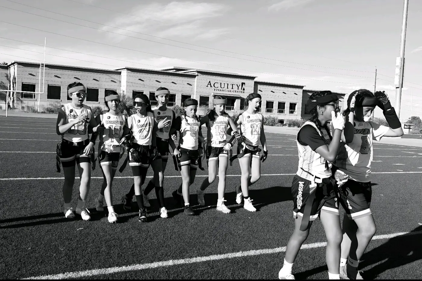 Vegas Girls athletes walking onto the field together